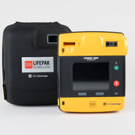 A black and yellow LIFEPAK 1000 AED standing next to its black carry case