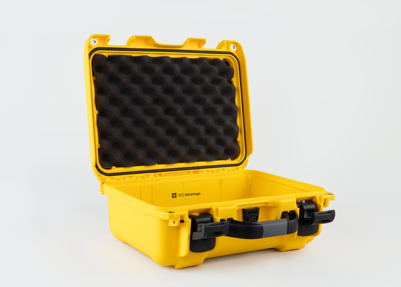 An open bright yellow hard AED case with black foam padding inside