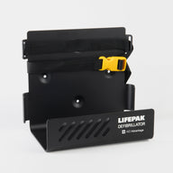 A black metal wall mount bracket with straps to secure a LIFEPAK 1000 AED