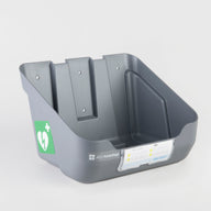 A gray bracket that mounts on a wall to hold a ZOLL AED 3 defibrillator