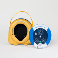 A blue and gray HeartSine 360P AED standing next to its yellow softshell carry case