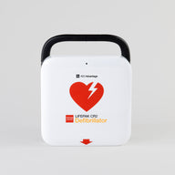 A white and red LIFEPAK CR2 AED with a black carry handle