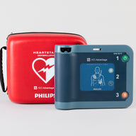 A blue Philips FRx AED displayed with its bright red carry case