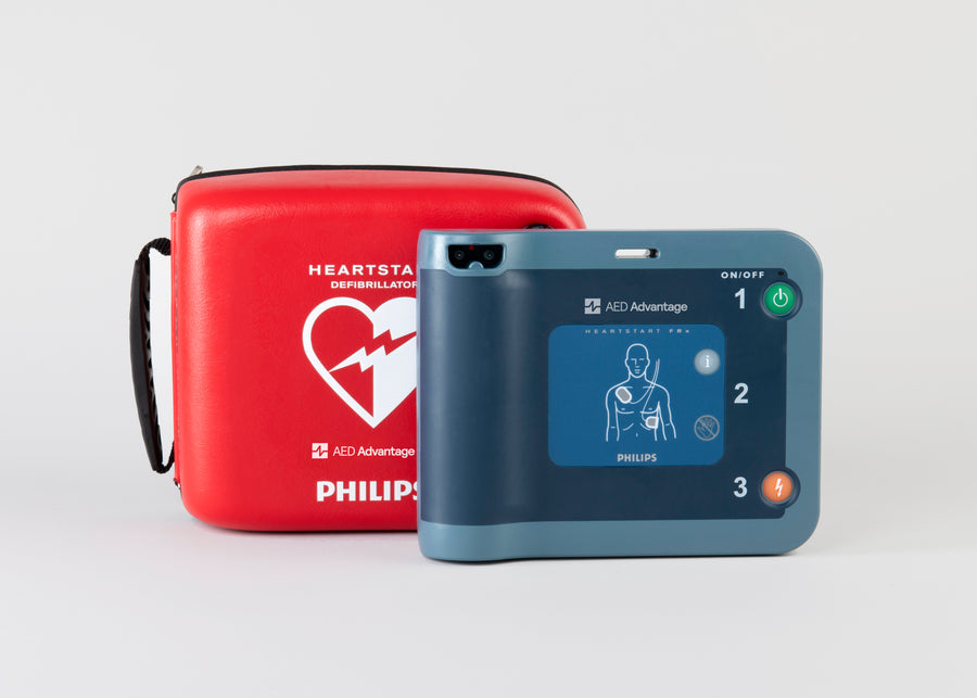 A blue Philips FRx AED displayed with its bright red carry case