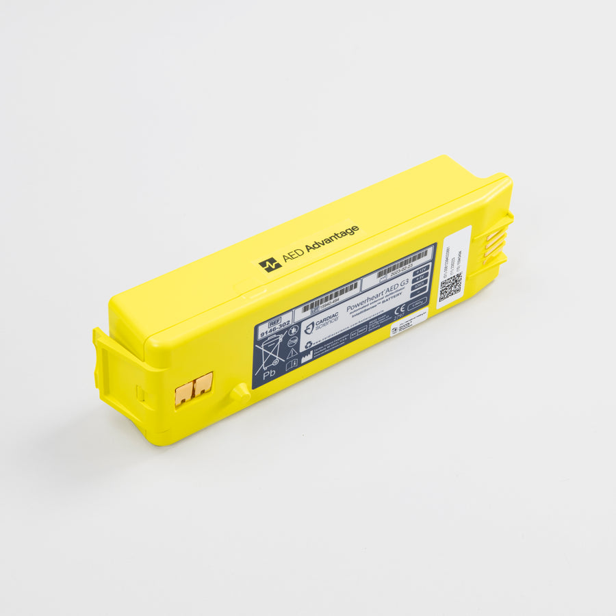 A bright yellow rectangular battery pack for the Powerheart G3 defibrillator