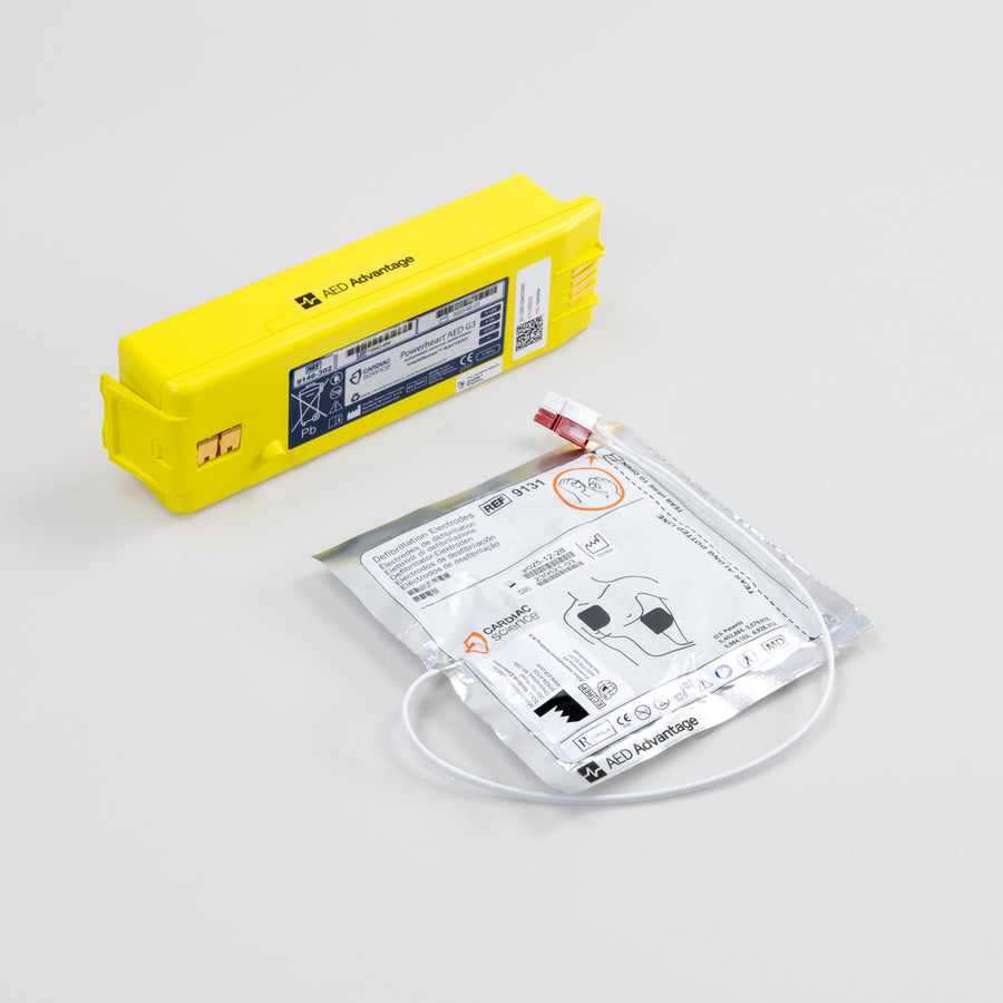 White electrodes package and bright yellow battery pack for the Powerheart G3 defibrillator