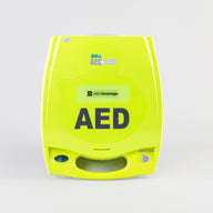 A green ZOLL AED Plus machine displayed with a gray background