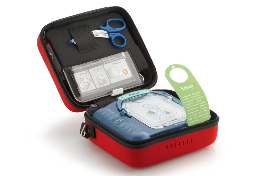 A blue philips onsite aed in its red carry case