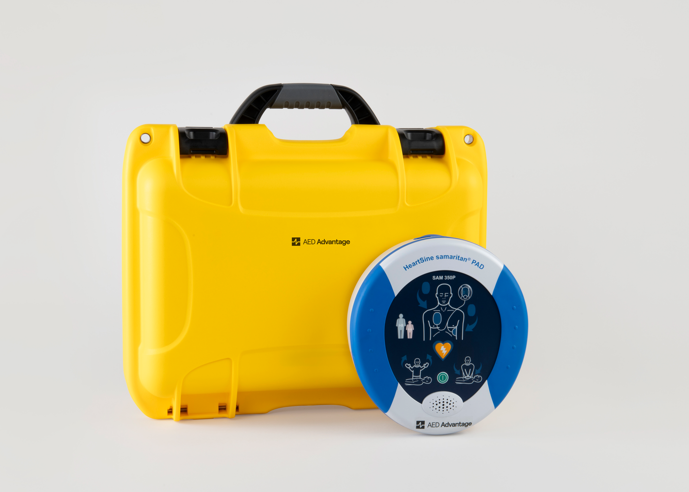 A blue and gray HeartSine 350P AED standing next to a bright yellow hardshell carry case