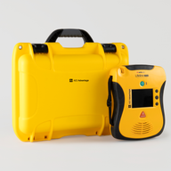 A yellow and black Defibtech Lifeline VIEW AED with a bright yellow hardshell carry case.