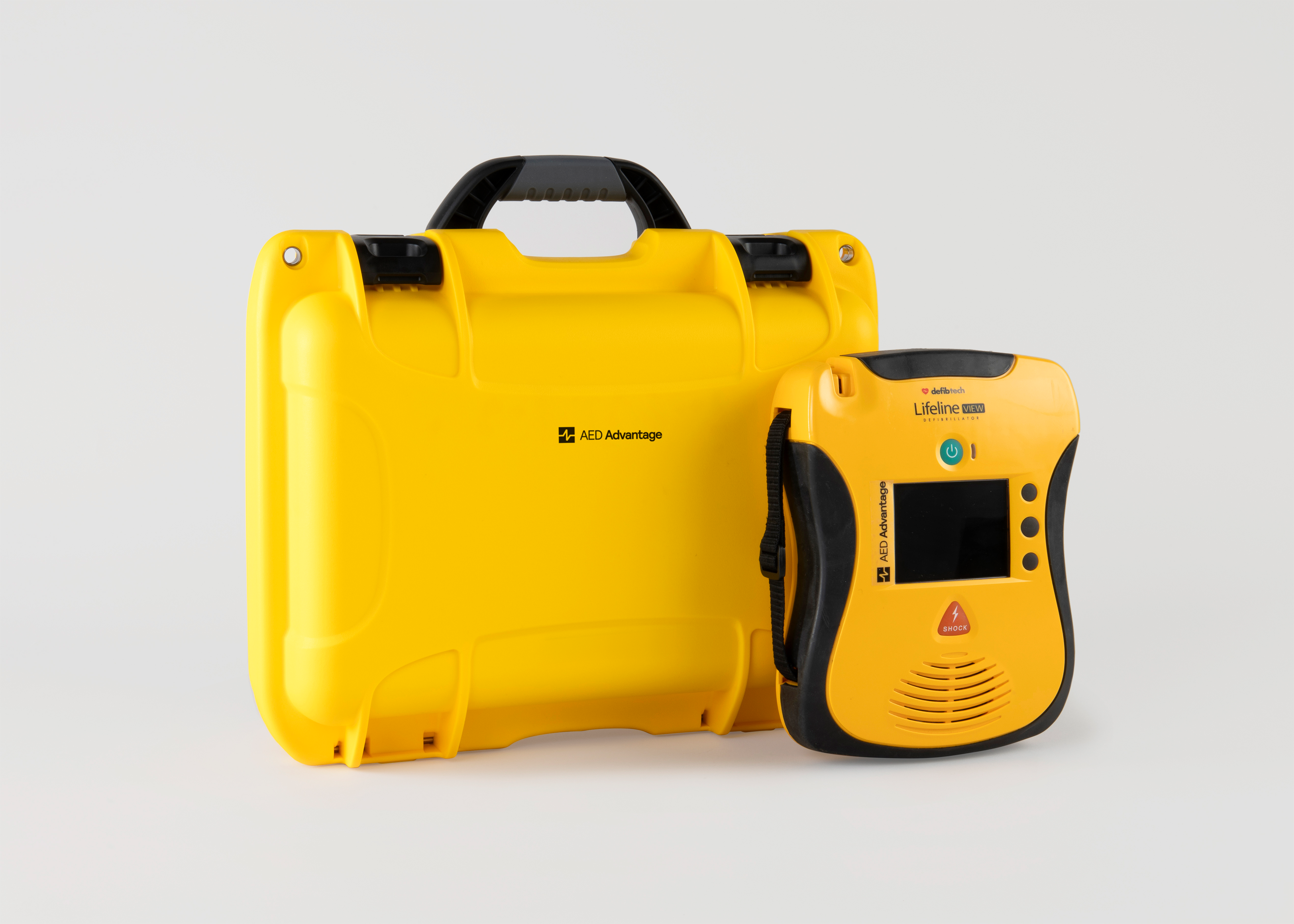 A yellow and black Defibtech Lifeline VIEW AED with a bright yellow hardshell carry case.