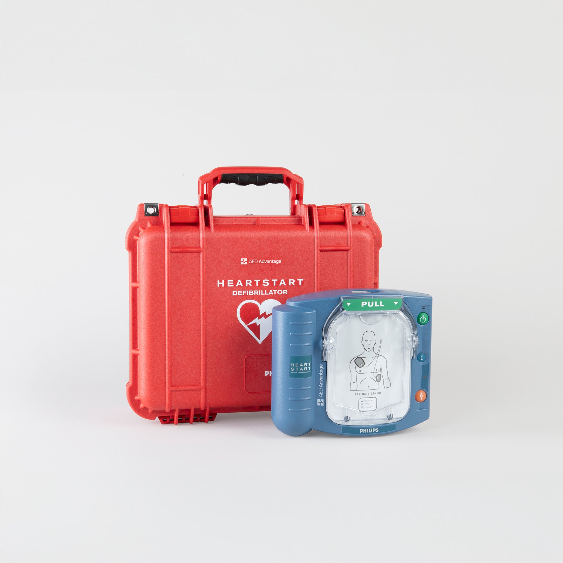 A blue Philips OnSite AED standing next to a bright red hardshell carry case