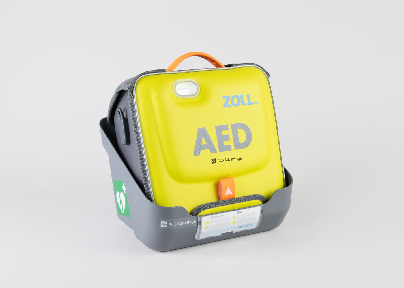 A gray wall mount bracket holding a bright green ZOLL AED 3