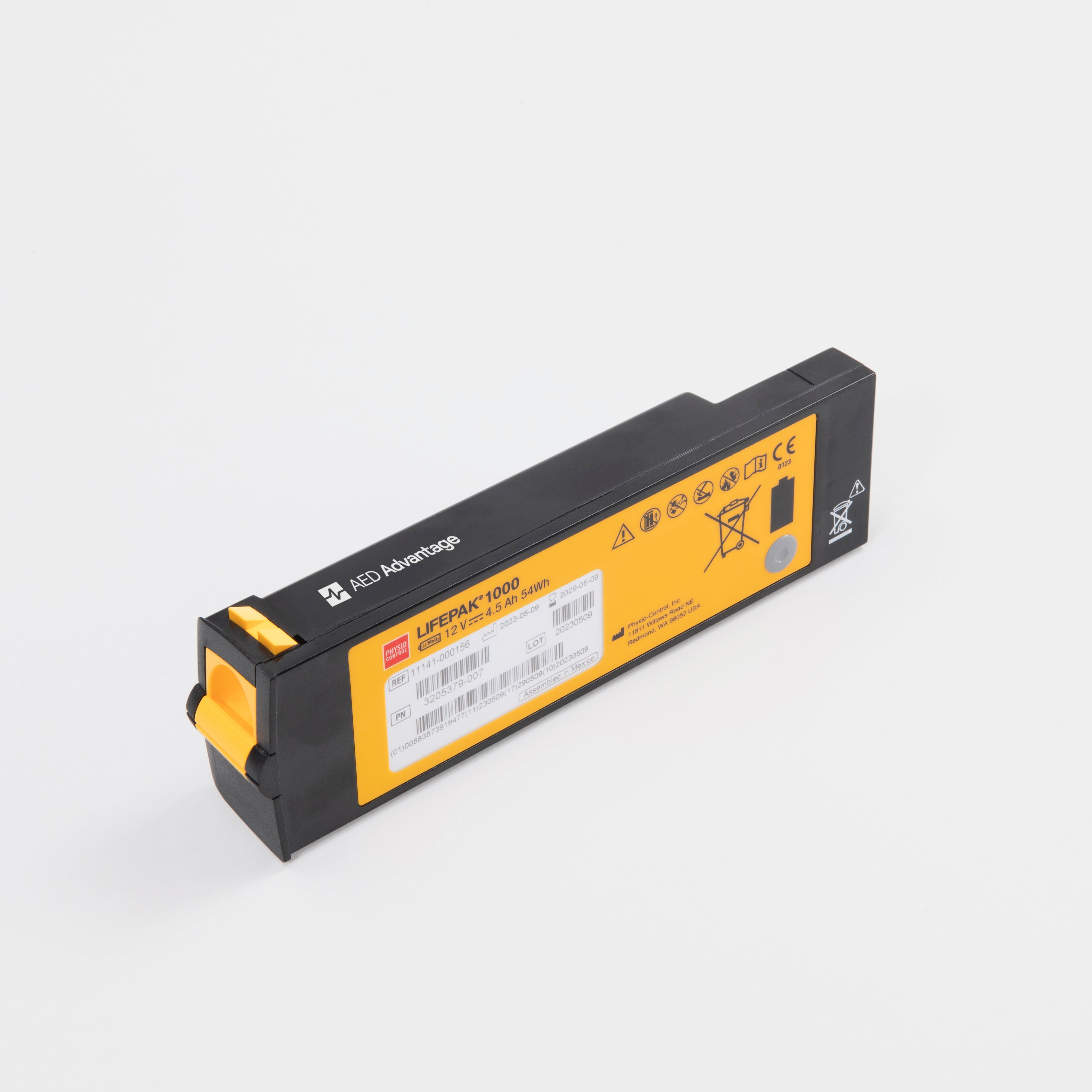 A black and yellow rectangular LIFEPAK 1000 AED battery pack