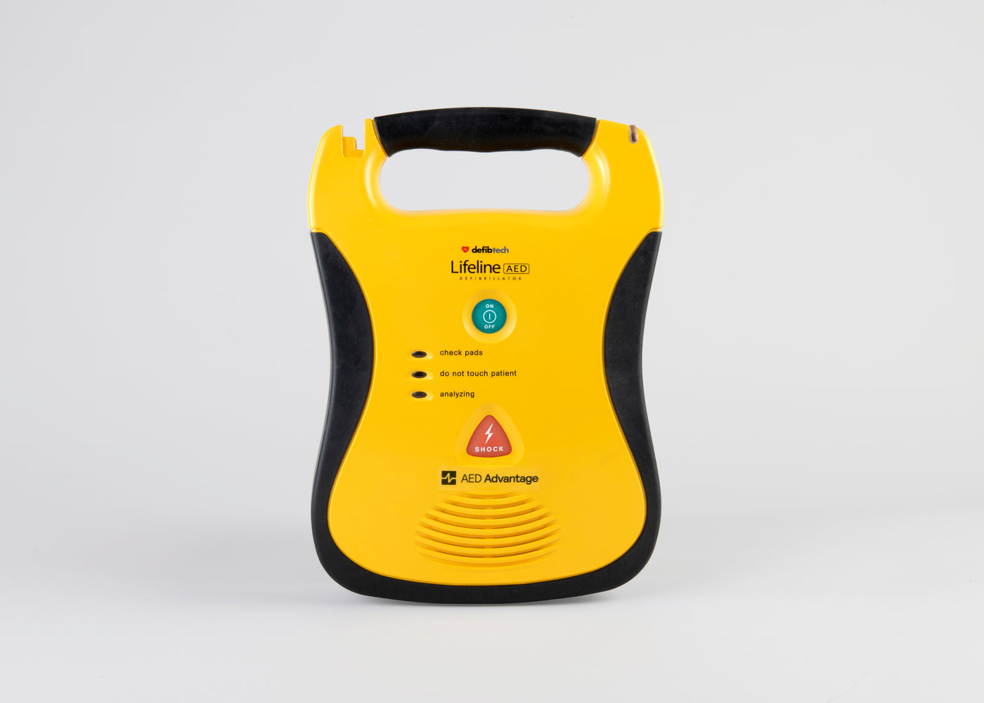 A black and yellow Defibtech Lifeline AED along with its battery pack and electrodes