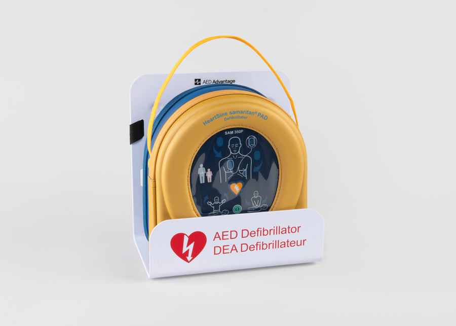 A HeartSine 350P AED in its yellow carry case displayed in a white wall mount bracket