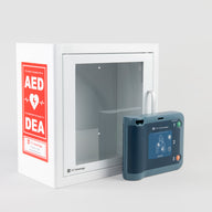 A blue Philips FRx AED standing in front of a white metal cabinet with red decals