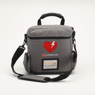 A gray carry bag containing a LIFEPAK CR2 training device