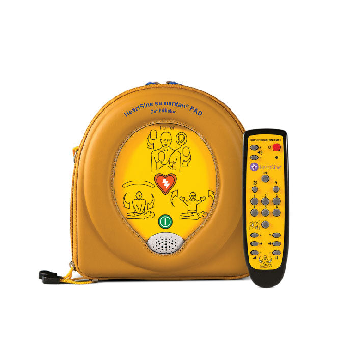 A yellow HeartSine training AED alongside its remote
